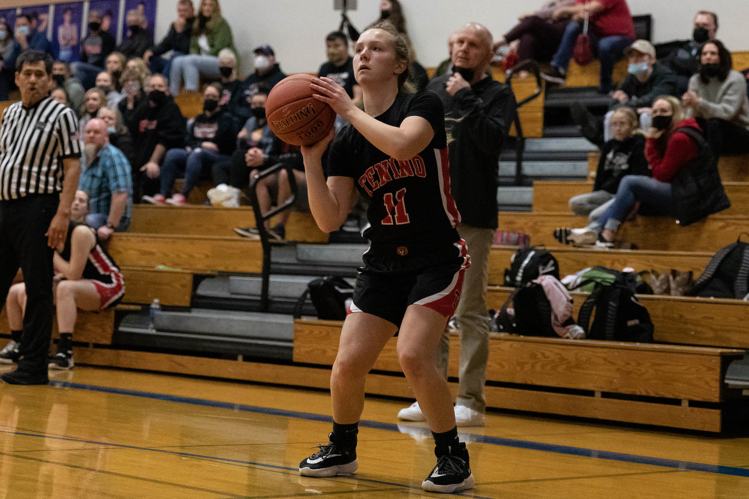 Tenino guard Megan Letts takes a shot against La Center in the 1A District IV semifinals Feb. 15.