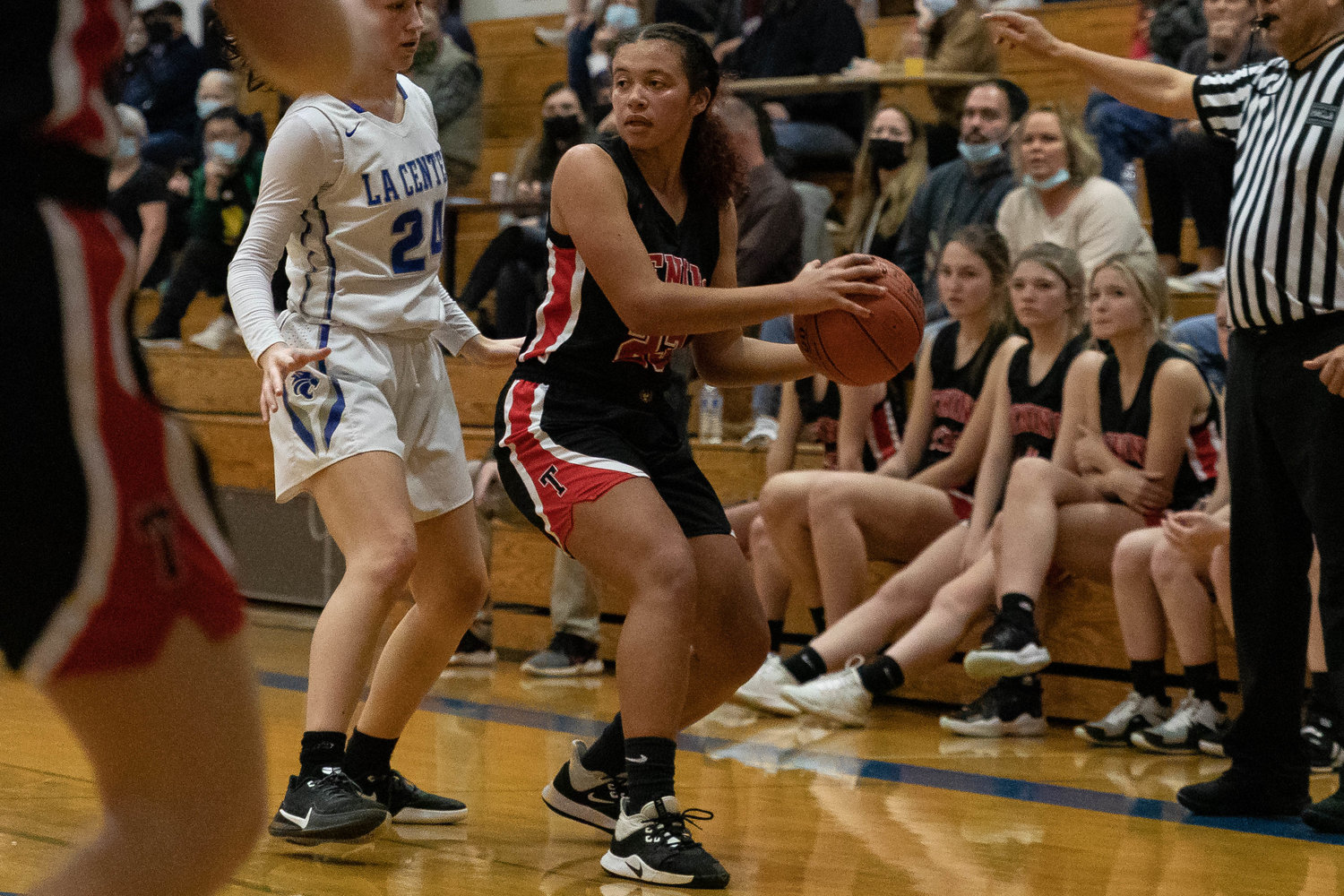 Tenino forward Alivia Hunter looks to pass down the baseline against La Center in the 1A District IV semifinals Feb. 15.