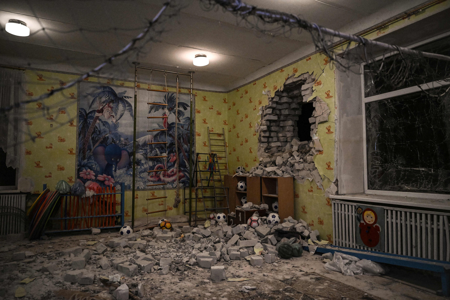 A photograph shows debris after the reported shelling of a kindergarden in the settlement of Stanytsia Luhanska, Ukraine, on Thursday, Feb. 17, 2022. U.S. Defense Secretary Lloyd Austin warned on Feb. 17, 2022, of a provocation by Moscow to justify military intervention in Ukraine after "disturbing" reports of mutual accusations of bombing between the Ukrainian military and pro-Russian separatists. (Aris Messinis/AFP/Getty Images/TNS)