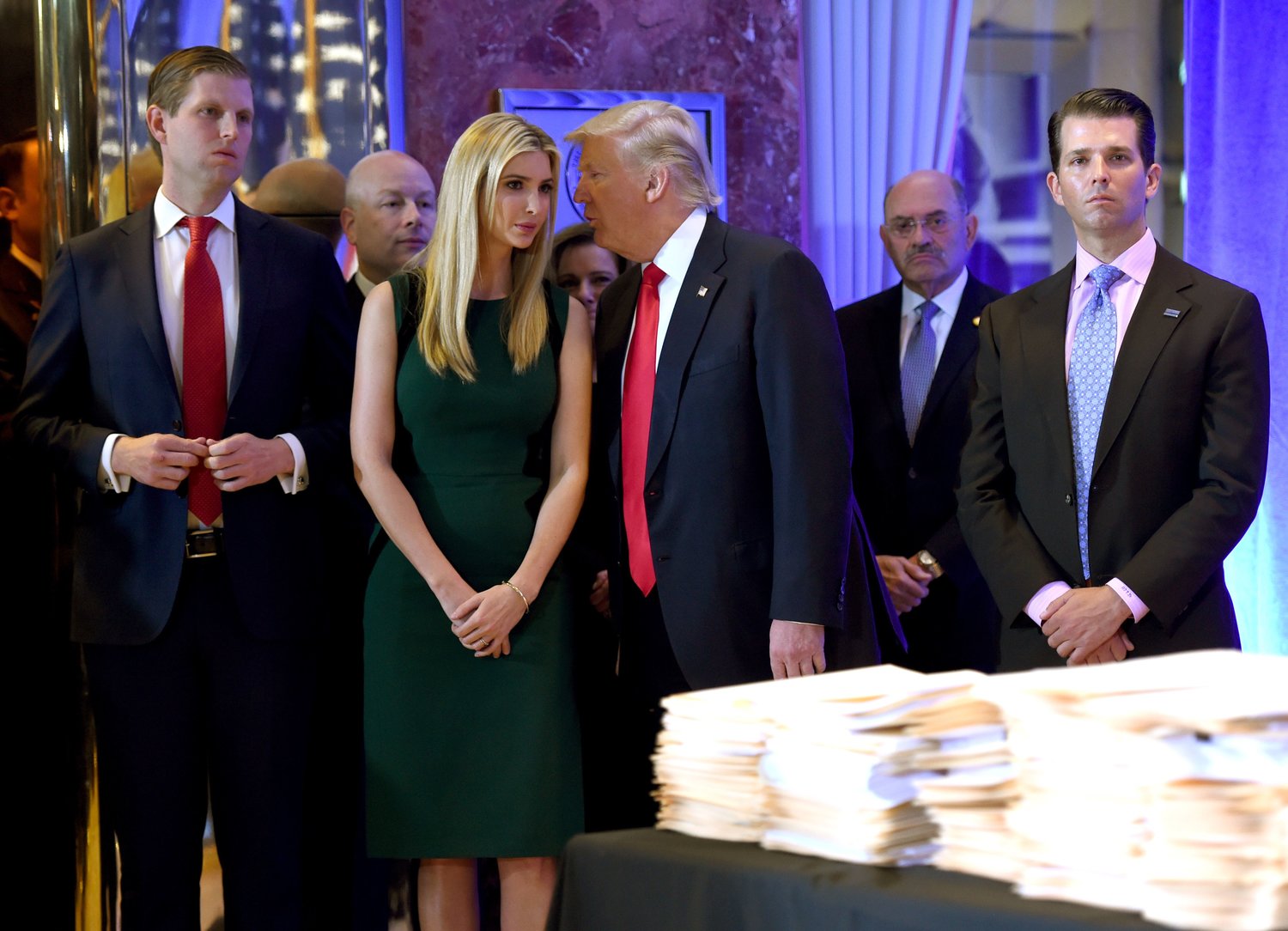 In this file photo from Jan. 11, 2017, Donald Trump along with his children Eric, left, Ivanka and Donald Jr. arrive for a news conference at Trump Tower in New York, accompanied by Allen Weisselberg, second from right, the chief financial officer of the Trump Organization.(Timothy A. Clary/AFP/Getty Images/TNS)