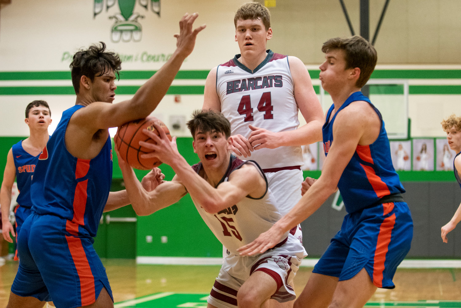 W.F. West's Seth Hoff (15) looks for room to operate against Ridgefield on Feb. 17.