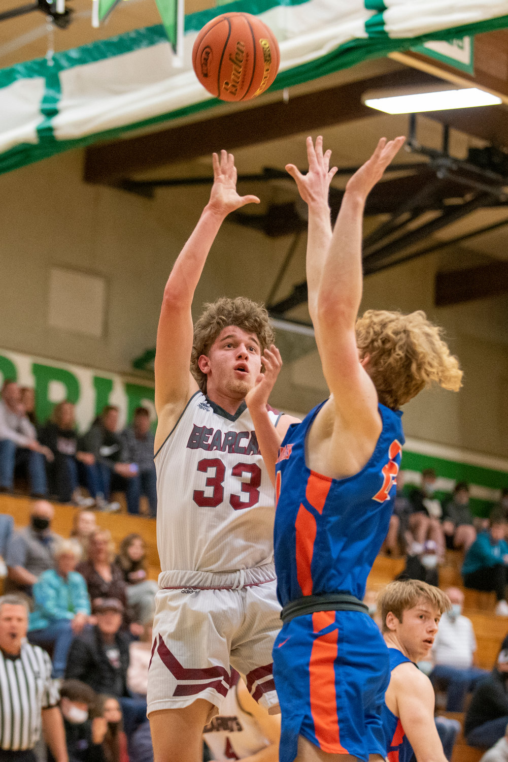 W.F. West Charlie Mallonee (33) throws up a floater against Ridgefield on Feb. 17.