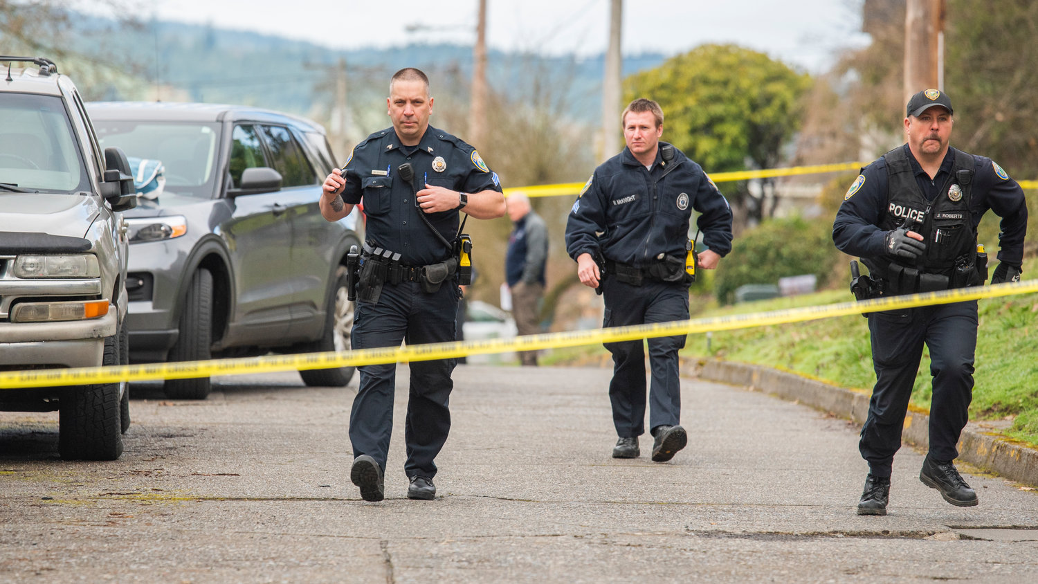 Law enforcement officers respond to the scene in Chehalis Friday.