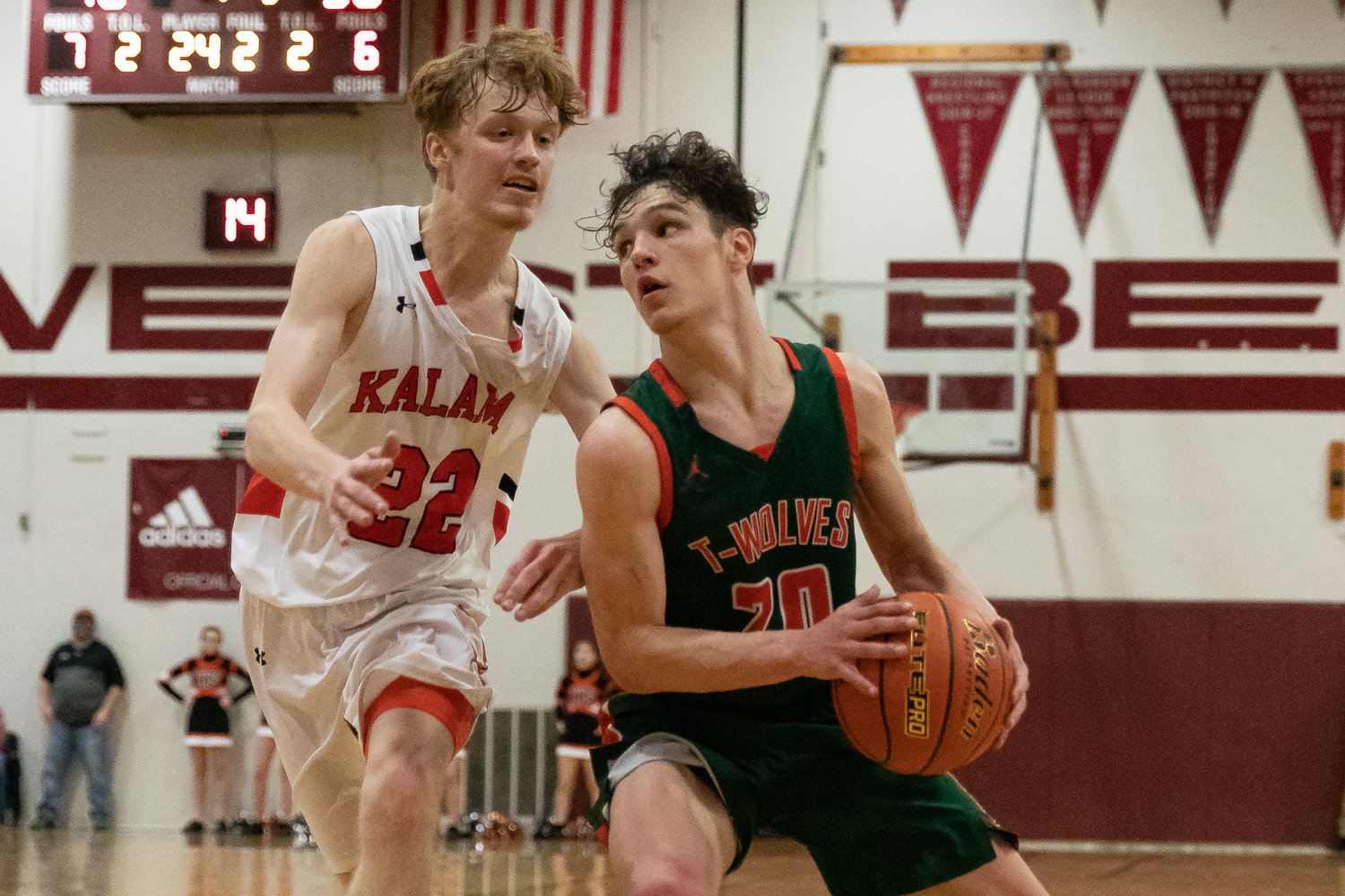 Morton-White Pass guard Kysen Collette drives past Kalama's Dylan Mills in the 2B District IV Championship at W.F. West Feb. 19.