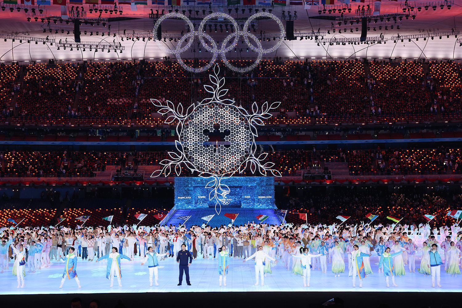 The Olympic Cauldron and rings are seen as performers dance during the Beijing 2022 Winter Olympics Closing Ceremony on Day 16 of the Beijing 2022 Winter Olympics at Beijing National Stadium on Feb. 20, 2022, in Beijing. (Lintao Zhang/Getty Images/TNS)