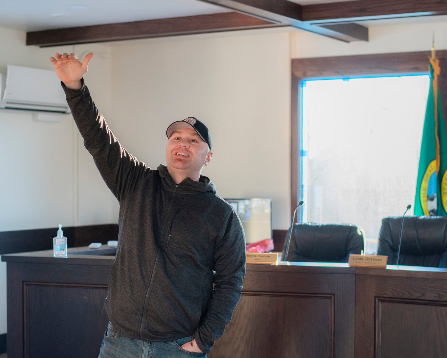 Tenino Mayor Wayne Fournier talks about work done to the roof to bring back the exposed beam concept inside Tenino City Hall Friday afternoon.