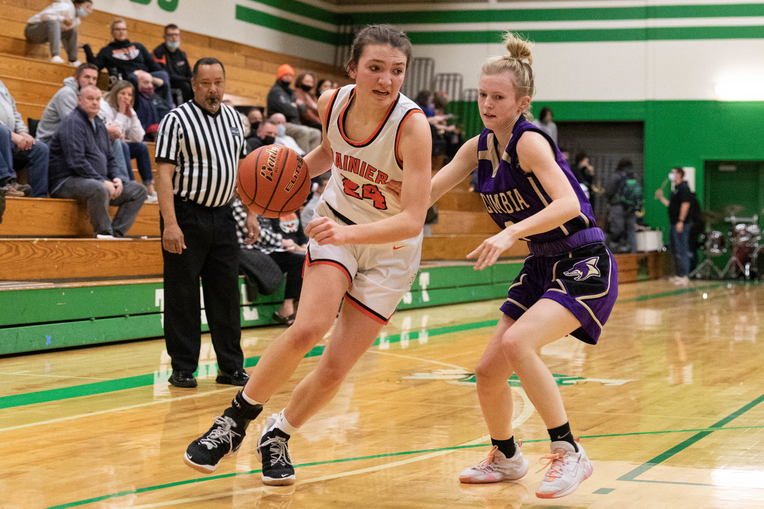 Rainier forward Bryn Beckman drives baseline against Columbia (Burbank) in the regional round of the state tournament at Tumwater Feb. 25.