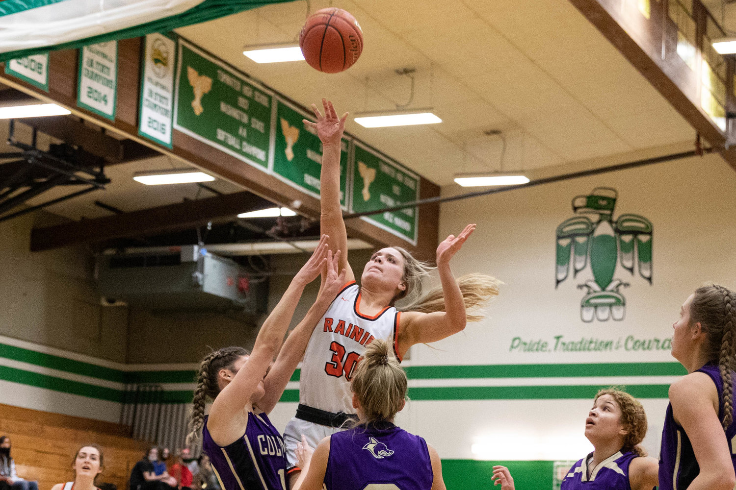Rainier forward Isabella Holmes puts up a floater against Columbia (Burbank) in the regional round of the state tournament at Tumwater Feb. 25.