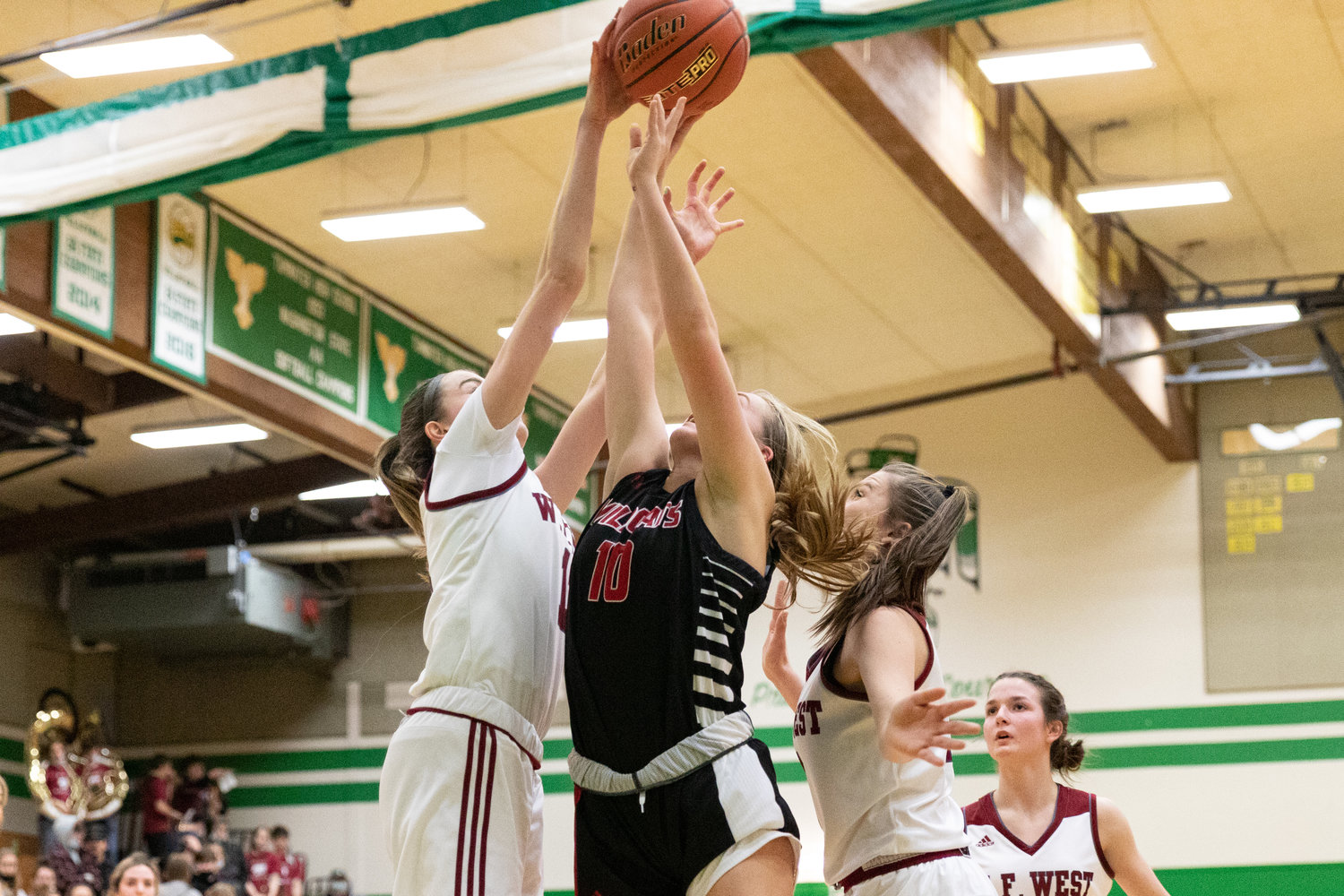 W.F. West forward Drea Brumfield blocks Archbishop's Murphy's Hannah Humphrey in the regional round of the state tournament at Tumwater Feb. 25.