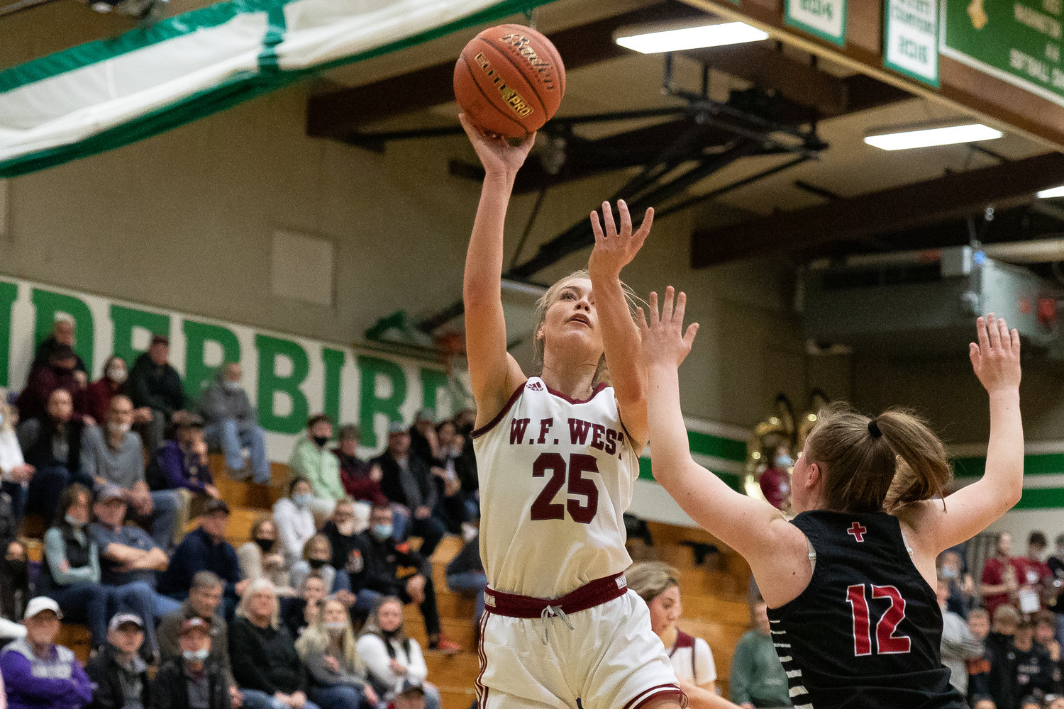 W.F. West guard Kyla McCallum attempts a shot against Archbishop Murphy in the regional round of the state tournament at Tumwater Feb. 25.