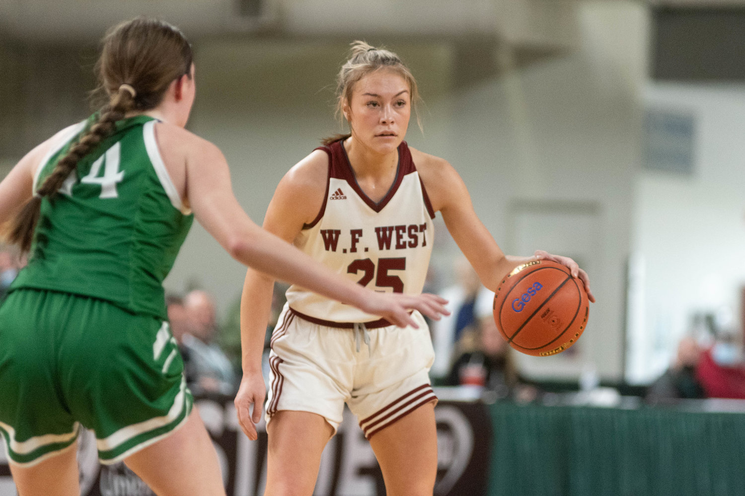 W.F. West guard Kyla McCallum scans the defense against Lynden in the 2A State Tournament at the Yakima Valley SunDome March 2.