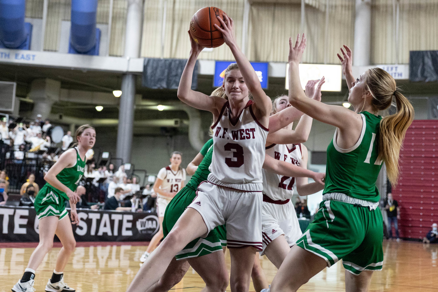 W.F. West forward Lexi Roberts hauls in a rebound against Lynden in the 2A State Tournament at the Yakima Valley SunDome March 2.