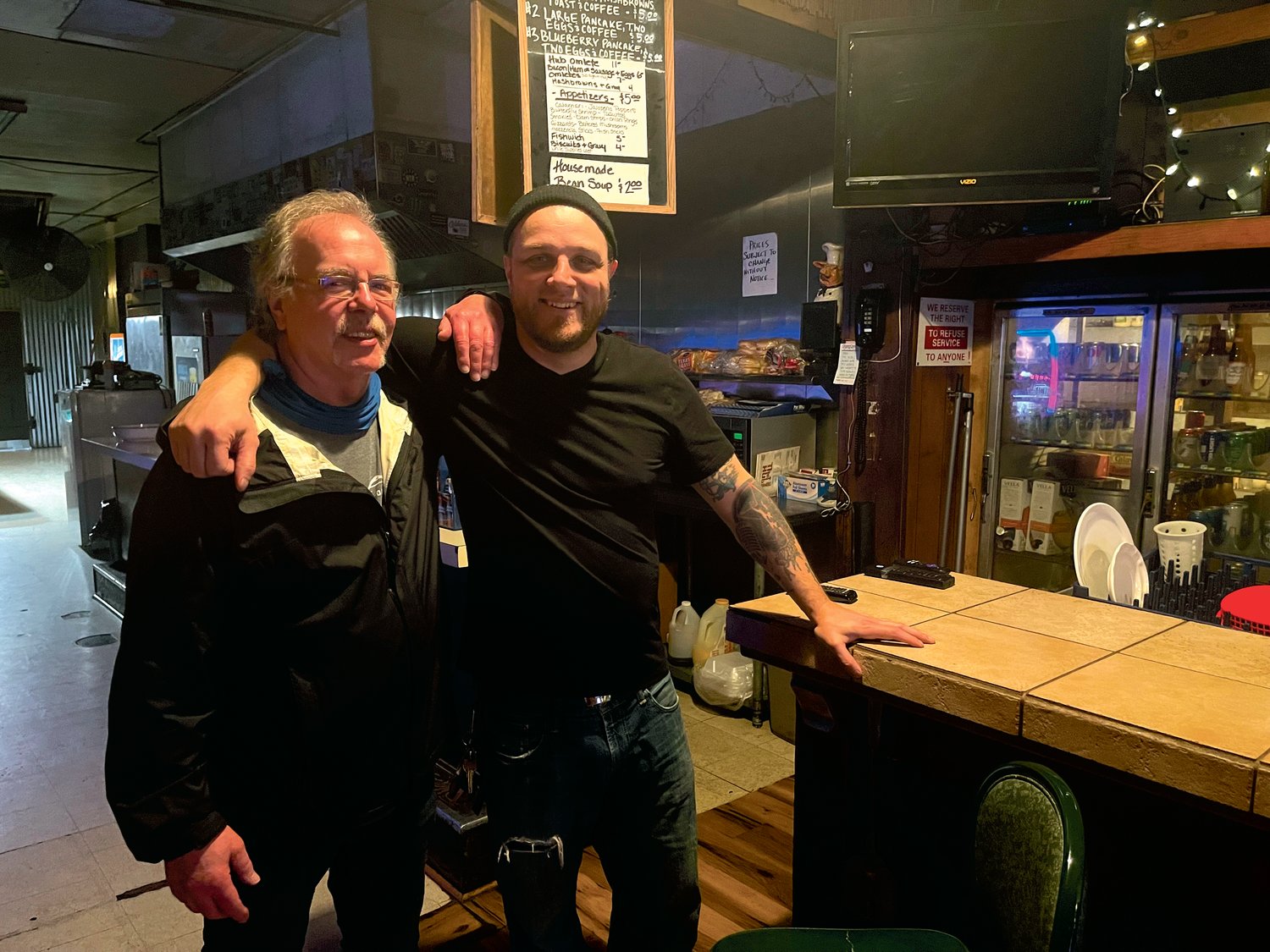 The Hub Bar & Grill owner James Francis, at left, is selling the establishment to longtime bartender Tim Filer, of McFiler’s Restaurant in Chehalis. Due to planned renovation work, The Hub will be closed for at least eight months.