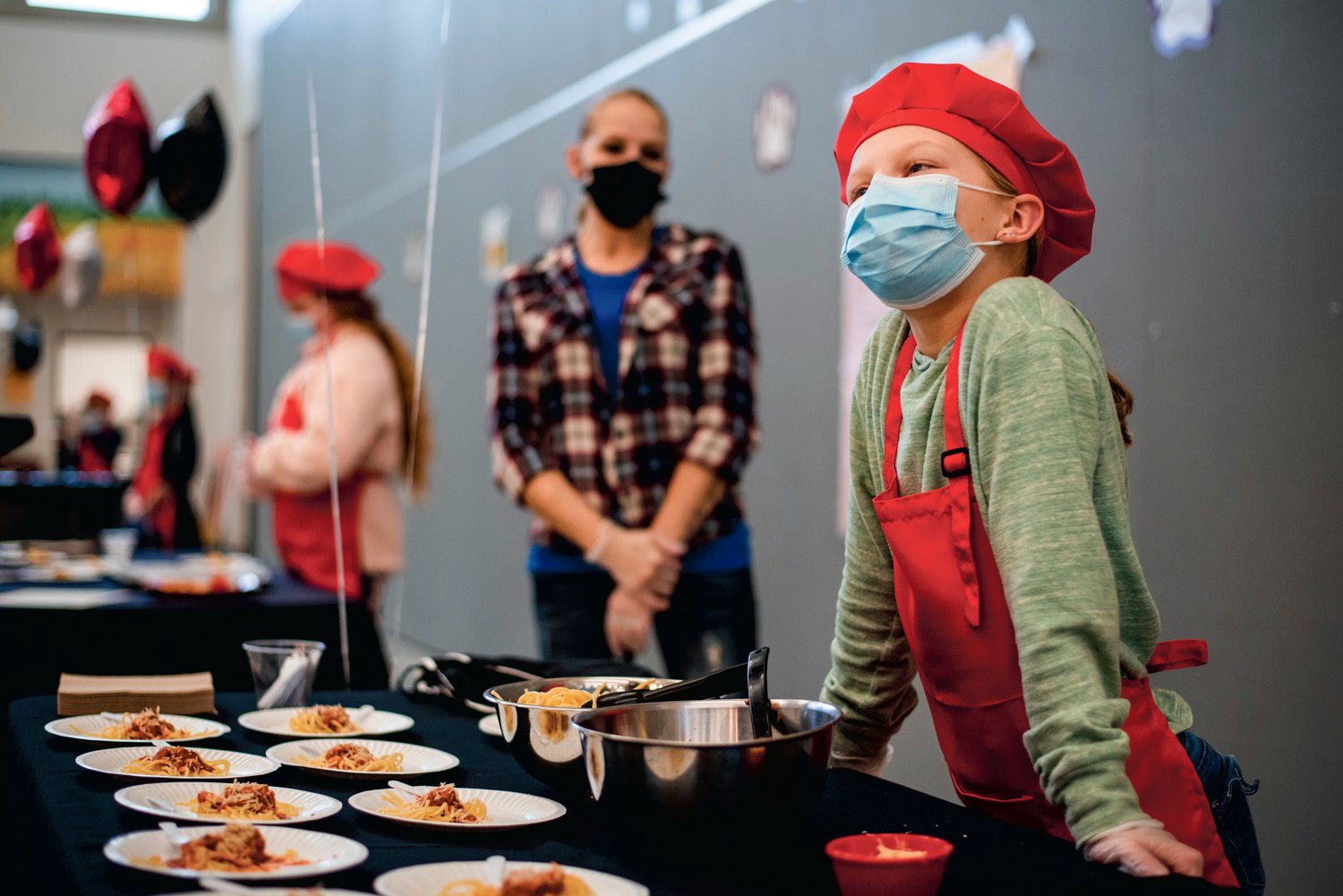 Ashtyn Gallagher, a fourth grader at Orin C. Smith Elementary, talks about her turkey meatballs during a Future Chef event Monday in Chehalis.