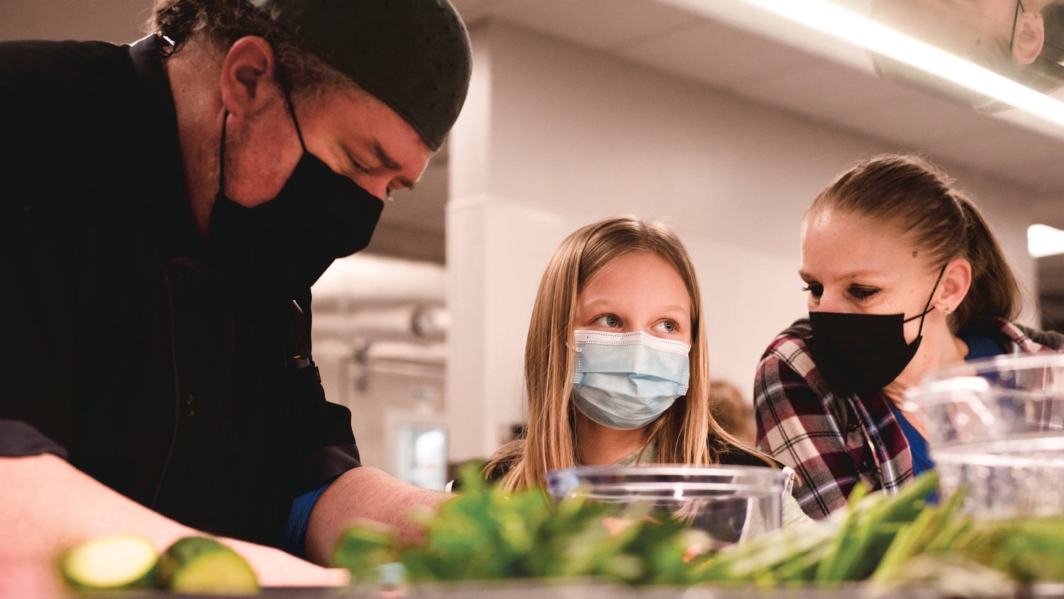 Students in the Future Chef program work with professionals to prepare dishes for judges based on recipes they create Monday at Orin C. Smith Elementary in Chehalis.