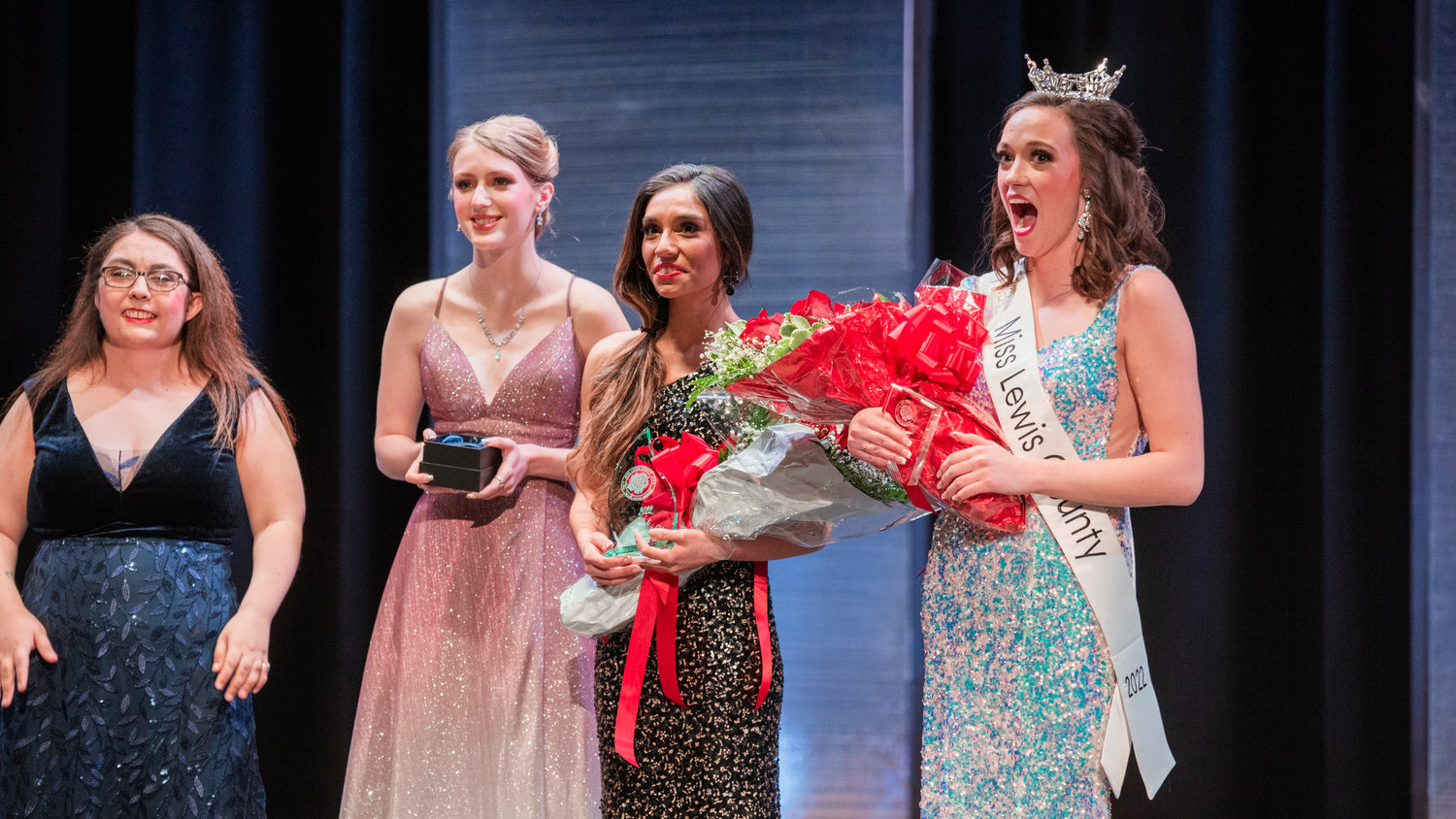 Briana Rasku reacts to being crowned Miss Lewis County during an event held at Centralia High School Saturday night.