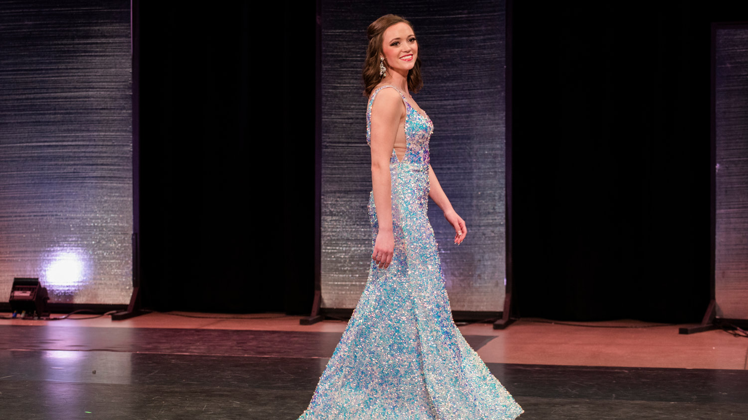 Briana Rasku competes in the Red Carpet portion of a Miss Lewis County event held at Centralia High School Saturday night.