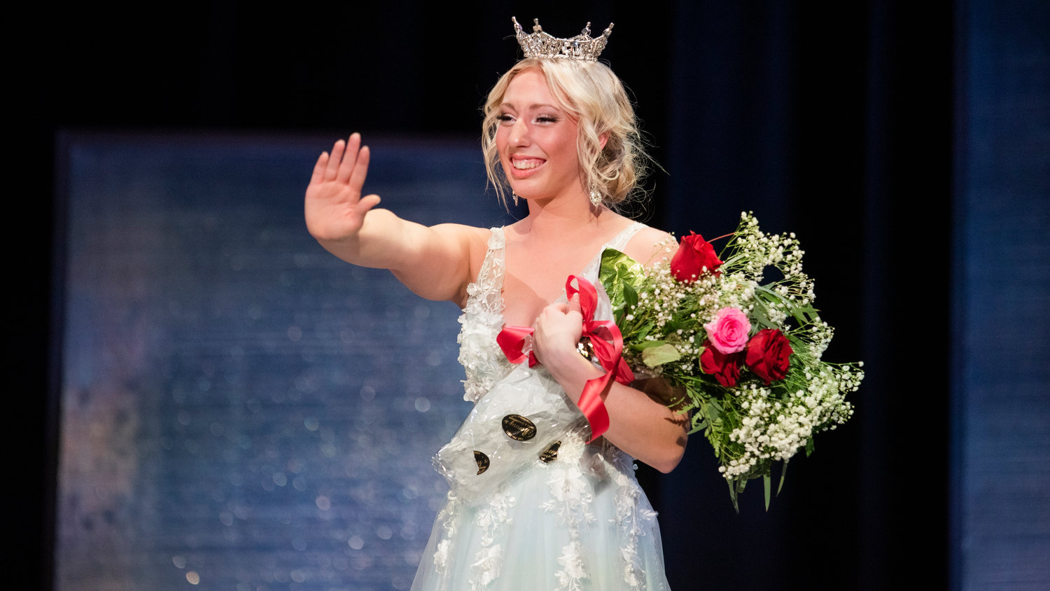 Miss Lewis County Sophie Moerke smiles and waves during an event held at Centralia High School Saturday night.