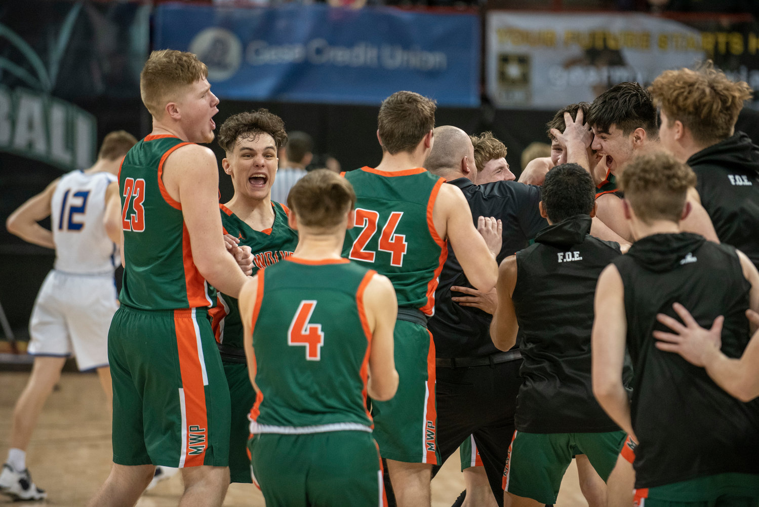 Morton-White Pass celebrates after defeating Colfax in the state quarterfinals Thursday in Spokane.