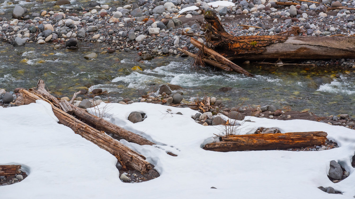 Water flows through Mount Rainier National Park near Ashford on Thursday.