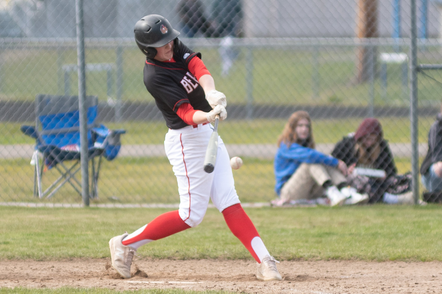 A Tenino player takes a swing against Rochester in the Scatter Creek Derby March 12.