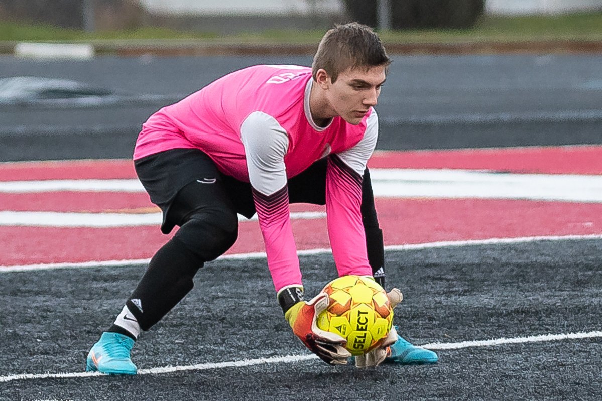 United's keeper makes a save against Tenino March 15 at Tenino Beaver Stadium.