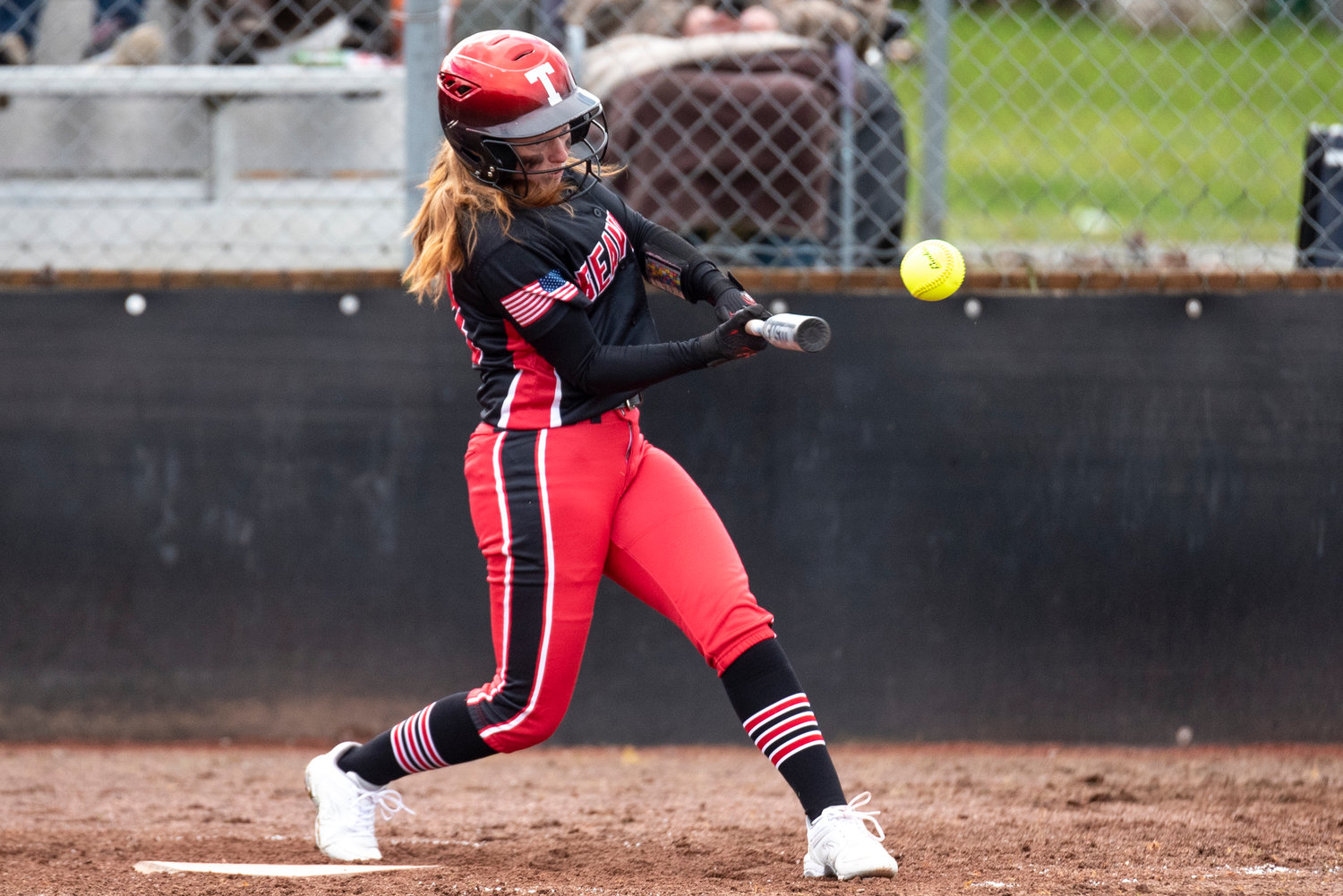 Tenino's Abby Severse connects on a Toledo pitch during a home game on March 16.
