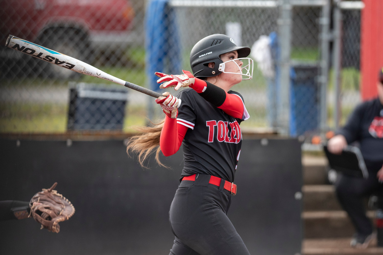 Tenino's Averie Robbins cracks a home run against Tenino on the road on March 16.
