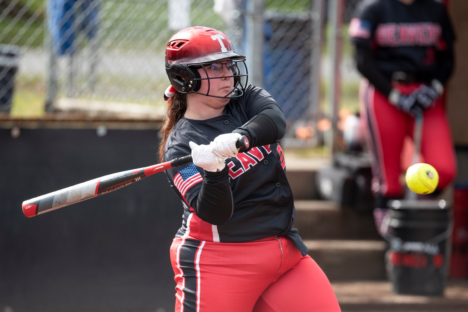 Tenino's Juliana Luken loads up to swing at a Toledo pitch at home on March 16.