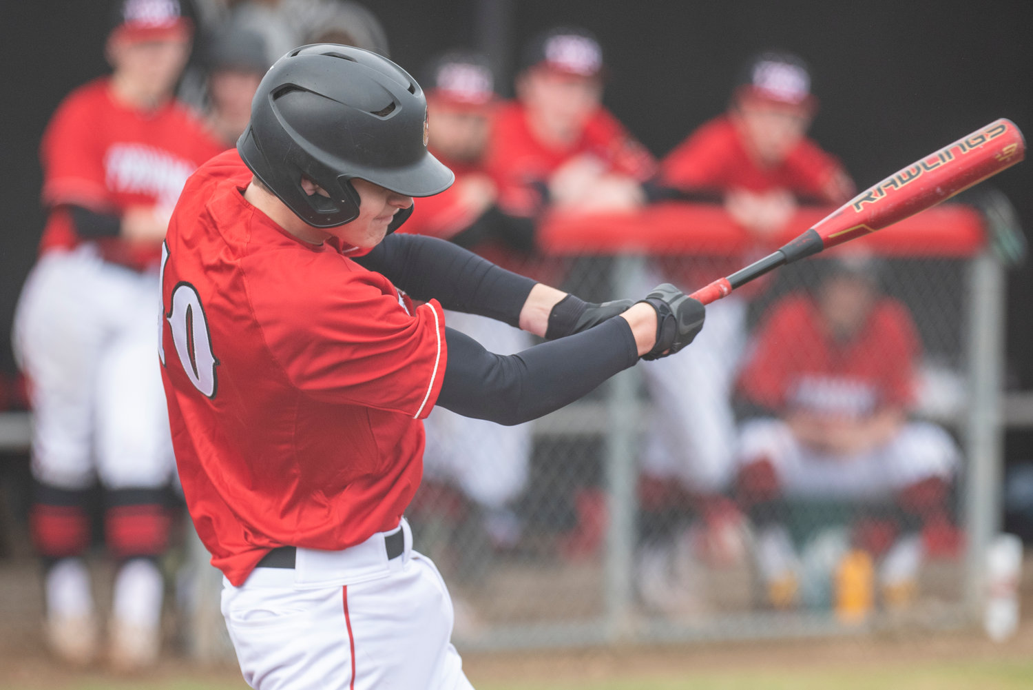 Tenino's Jack Burkhardt (10) takes a cut against Toledo during a home game on March 16.
