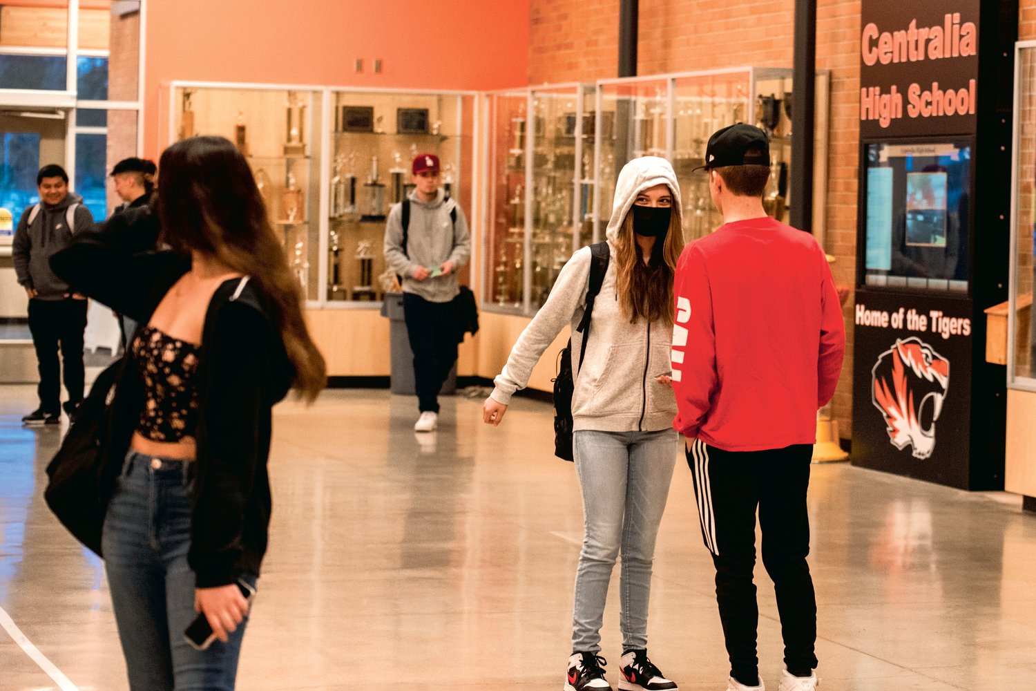 Students at Centralia High School mingle before class Tuesday morning.