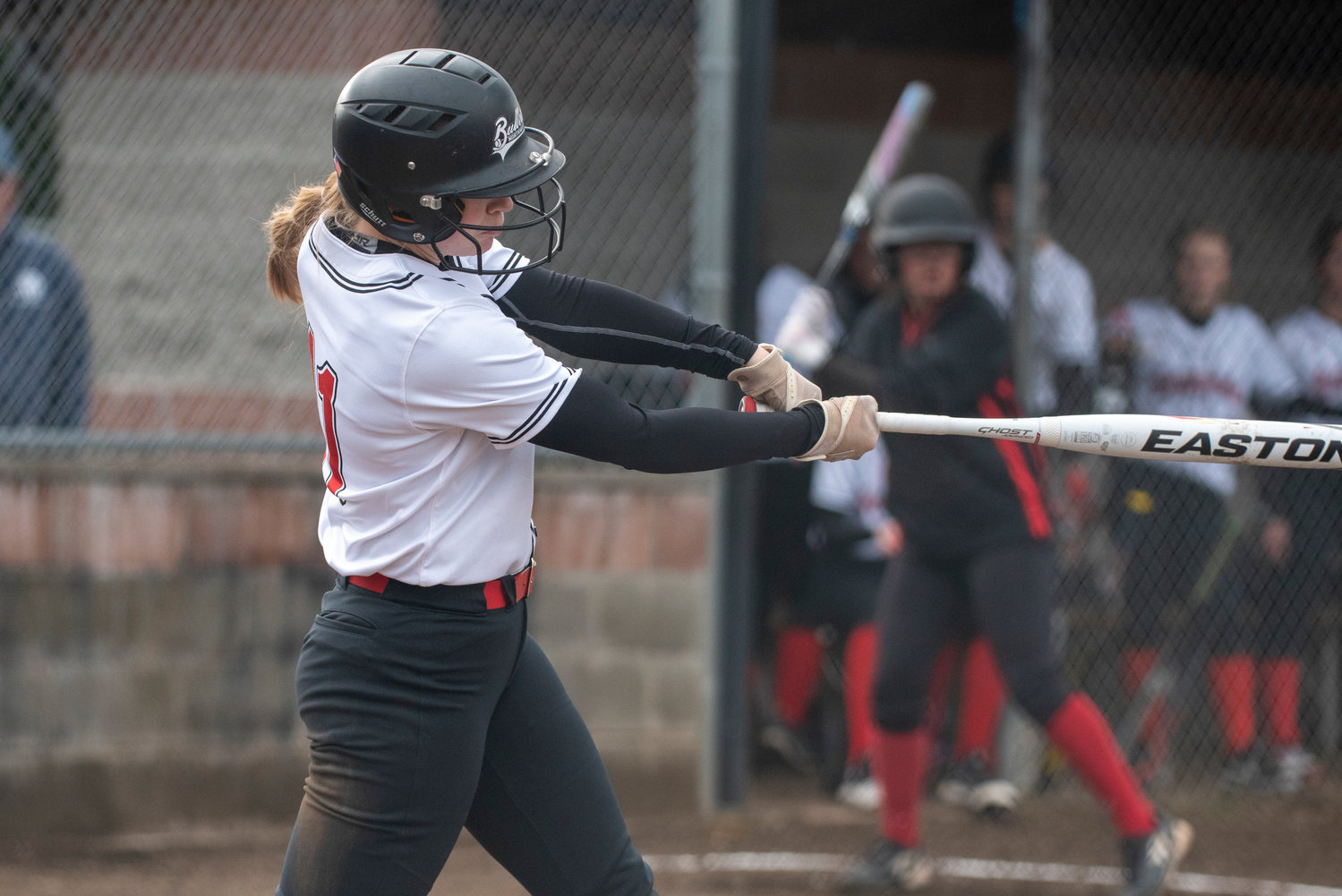 Mossyrock's Hailey Brooks connects on a Rainier pitch during a home game on March 18.