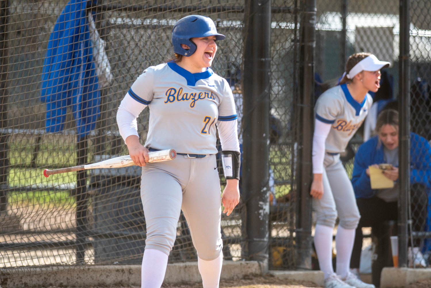 Centralia College's Kaylee Ashley (21) yells in celebratin after the Blazers' hit an RBI double against Chemeketa on March 25.