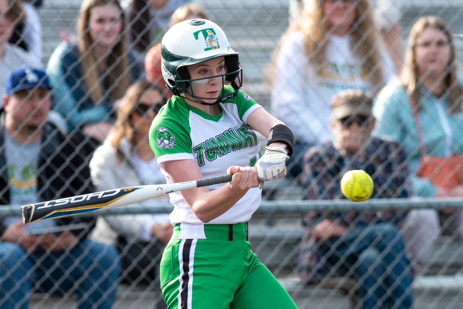 Tumwater's Kylie Waltermeyer loads up to swing at a Black Hills' pitch during a home game on March 25.