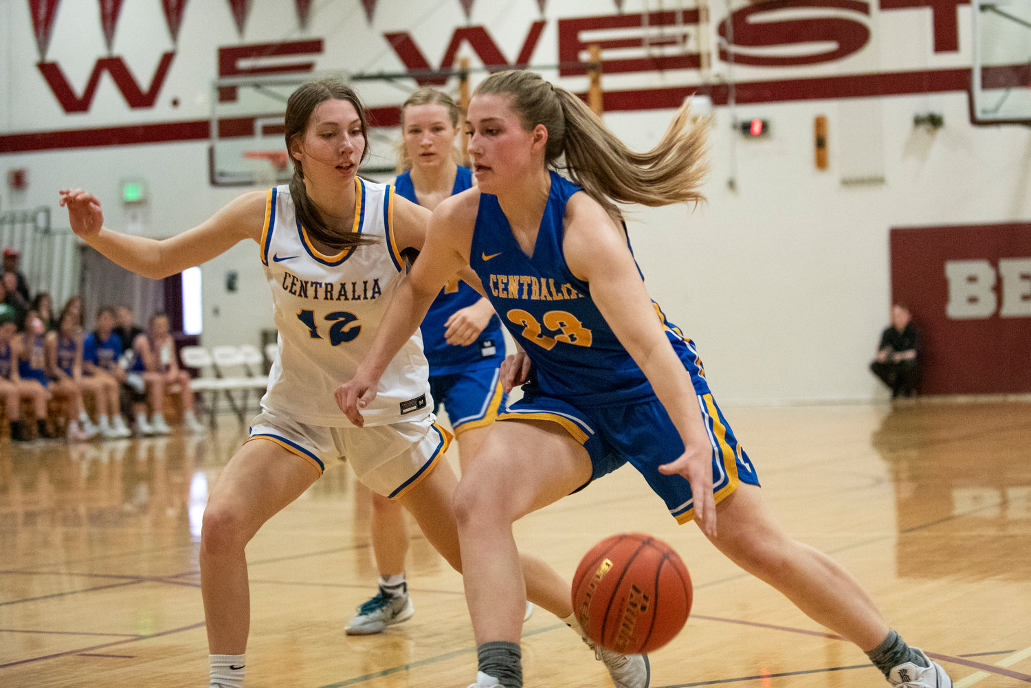 Winlock's Addison Hall (23) drives against Adna's Faith Wellander (12) during the SWW Senior All-Star Game at W.F. West High School on March 26.