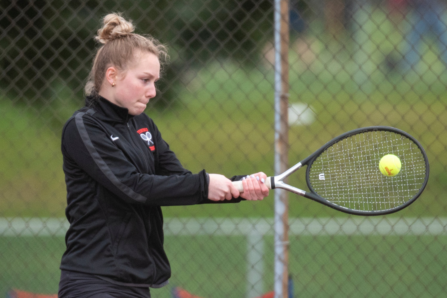 Tenino's No. 1 singles player Megan Letts returns an Eatonville serve during a home match on March 29.