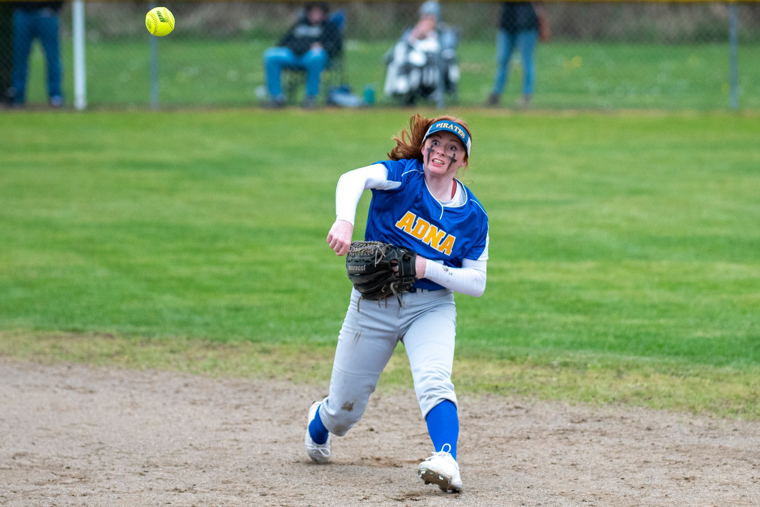 Adna second baseman Natalie Loose fires a throw to first for the out during a home game against Castle Rock on April 1.