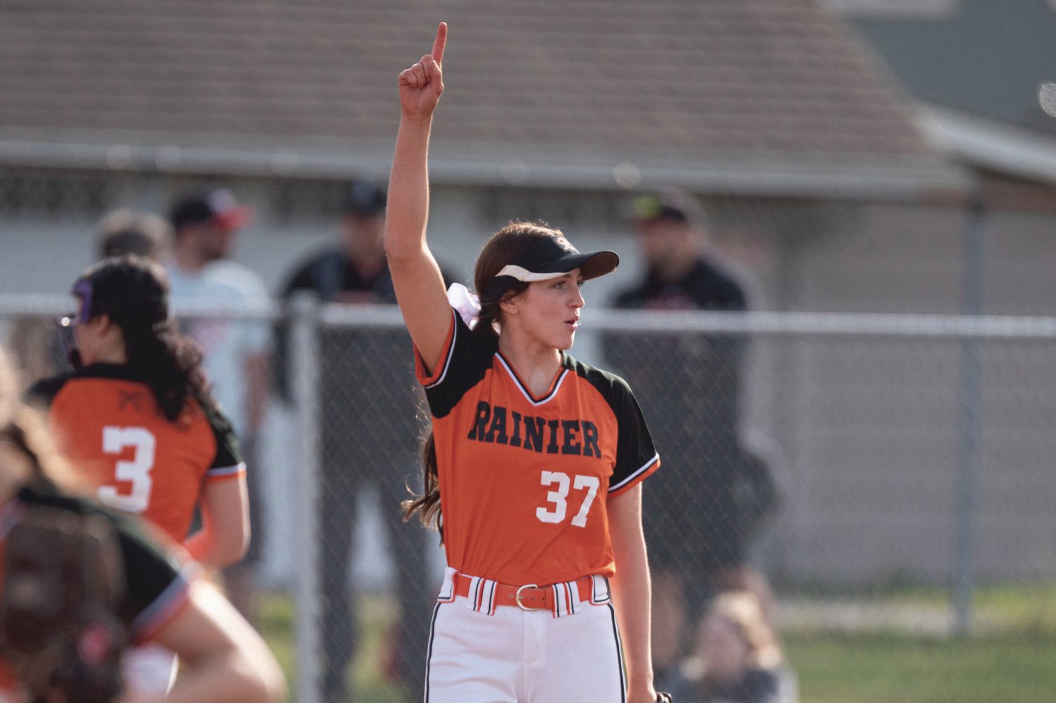 Rainier pitcher Bailey Elwell raises a finger after getting an out against Tenino on March 24. Elwell was named to The Chronicle's All-Area team after a strong 2022 season.
