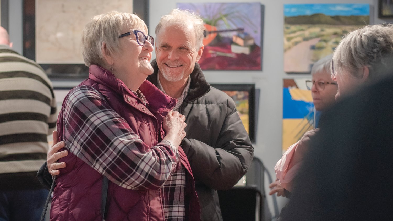 Edna Fund and Max Vogt greet each other during a young artist show and exhibition at the Rectangle Gallery & Creative Space Friday in Centralia.