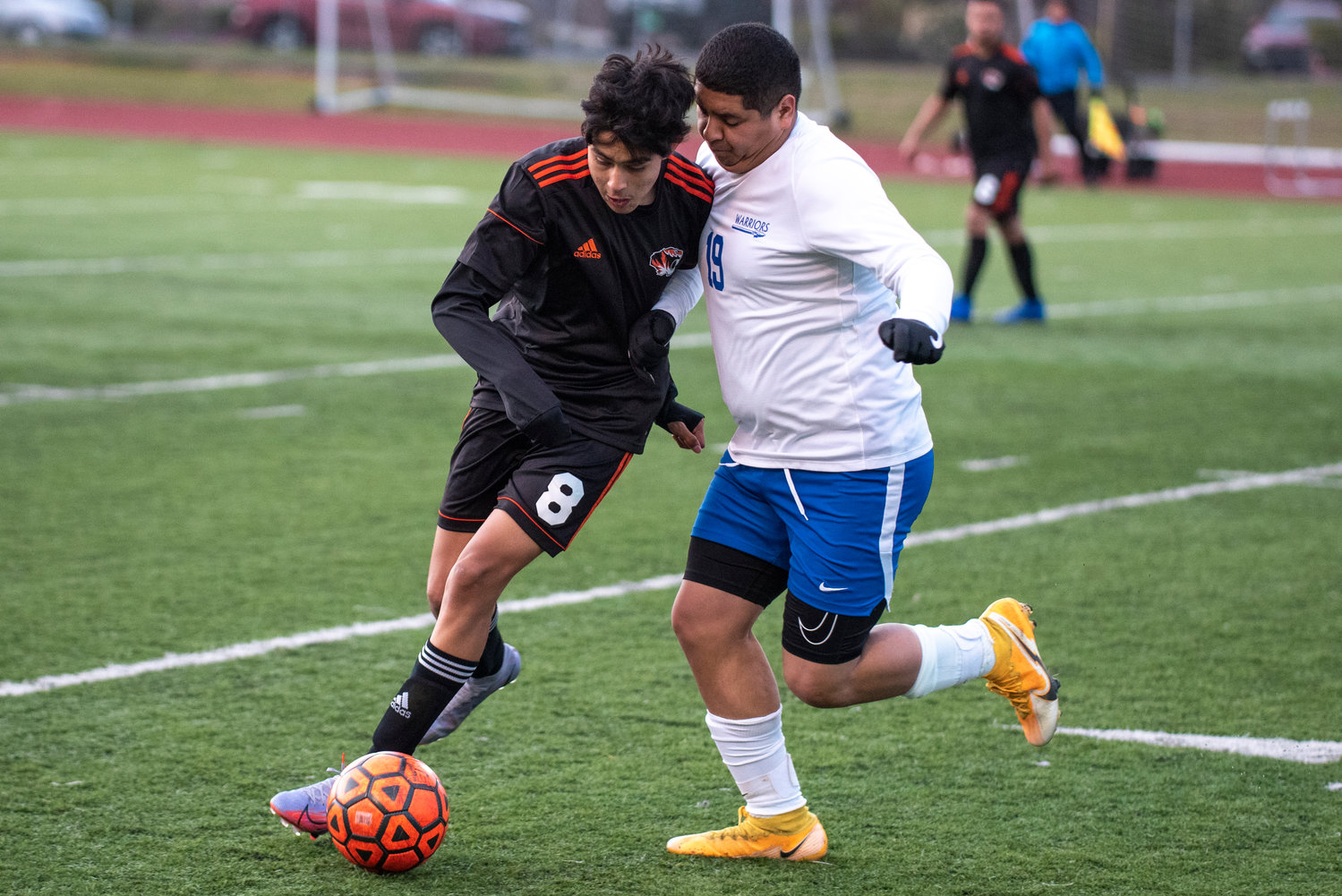 Centralia's Fernando Lopez (8) and Rochester's Ivoc Castillo (19) battle for the ball during a league game in Centralia on April 12.