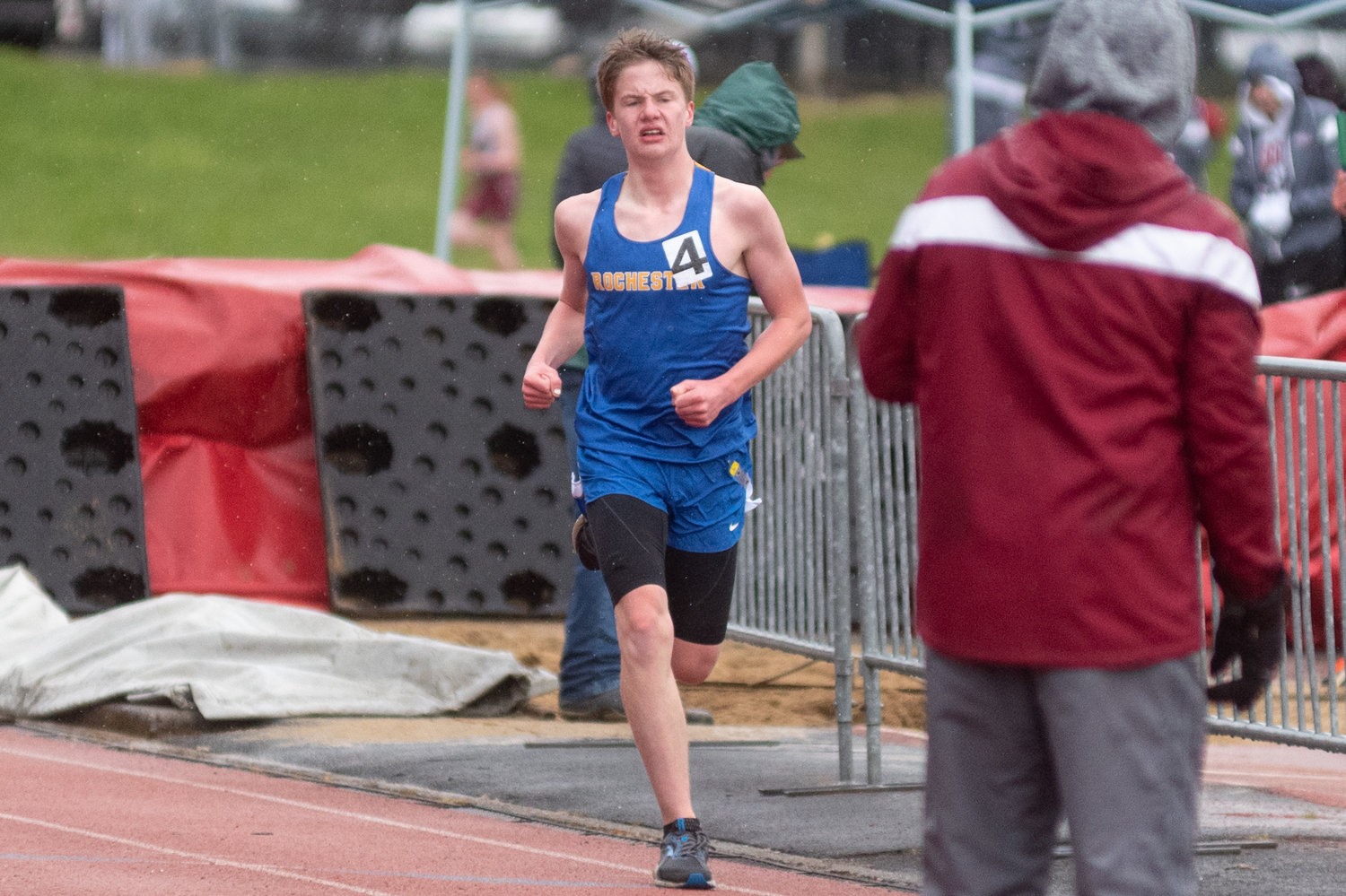 Rochester distance runner Gunnar Morgan sprints toward the finish line at W.F. West in the 1600m April 13.