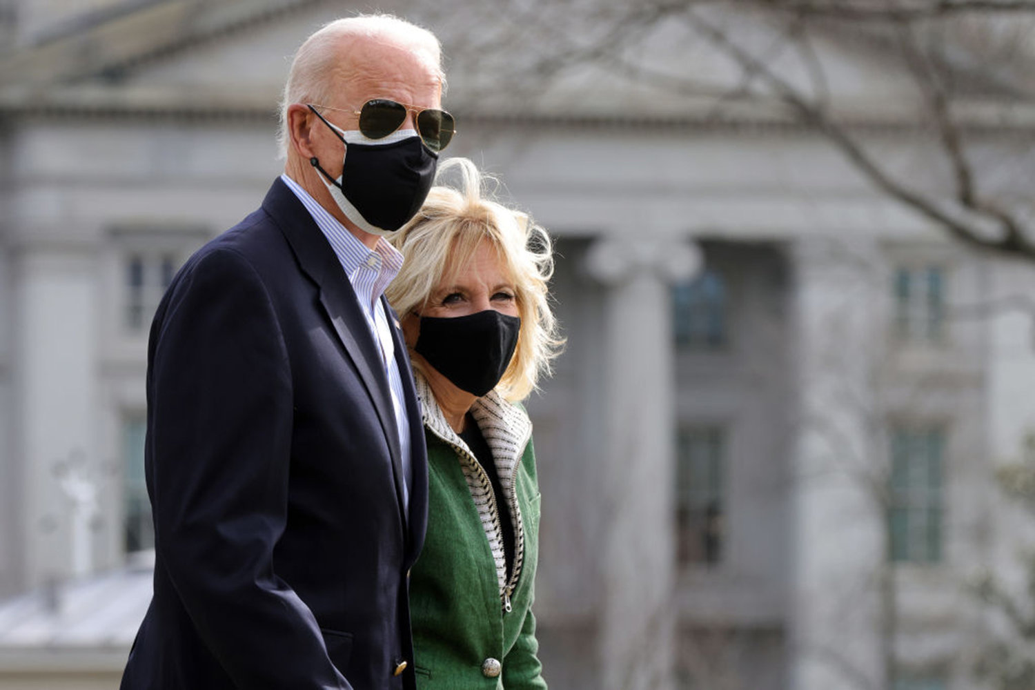 U.S. President Joe Biden and first lady Jill Biden walk towards the Marine One on the South Lawn before a departure from the White House Feb. 26, 2021 in Washington, D.C. The Bidens showed an annual combined income of $610,702 in 2021. (Photo by Alex Wong/Getty Images/TNS)