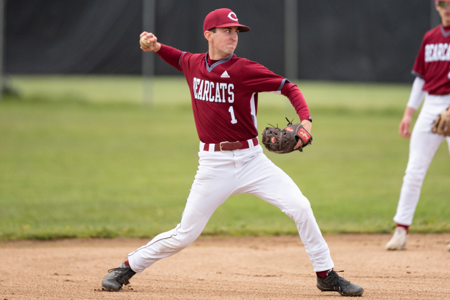 W.F. West's Brock Bunker throws toward first against Rochester April 19.