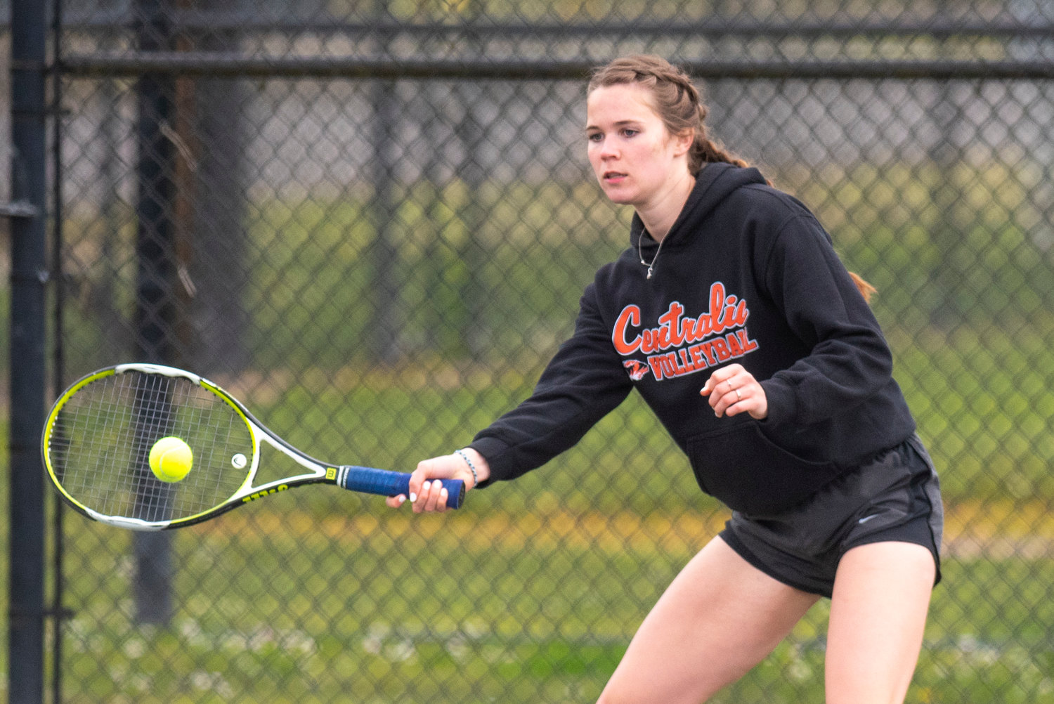 Centralia's Maddie Corwin returns a Black Hills serve during the No. 1 doubles match at home on April 19.