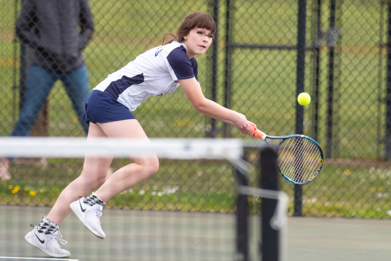 Black Hills Seinna Moore reaches to return a Centralia serve during the No. 1 doubles match on the road on April 19.