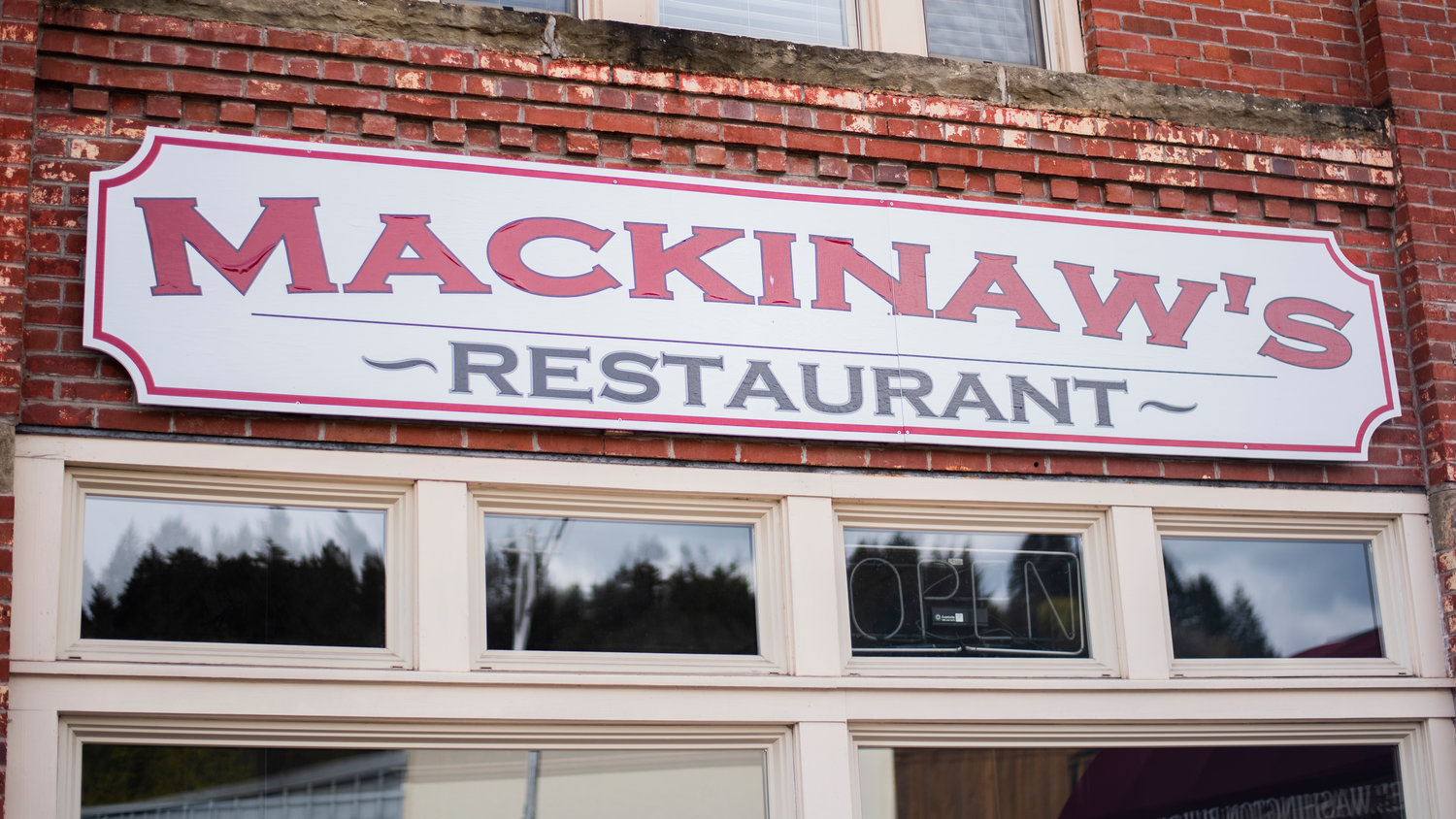 Mackinaw’s signage hangs on display in downtown Chehalis.