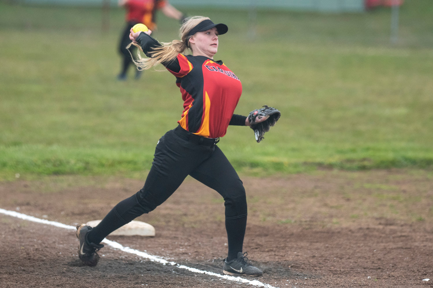 Winlock third baseman Maia Chaney makes a throw to first during a home game against Adna on April 20.