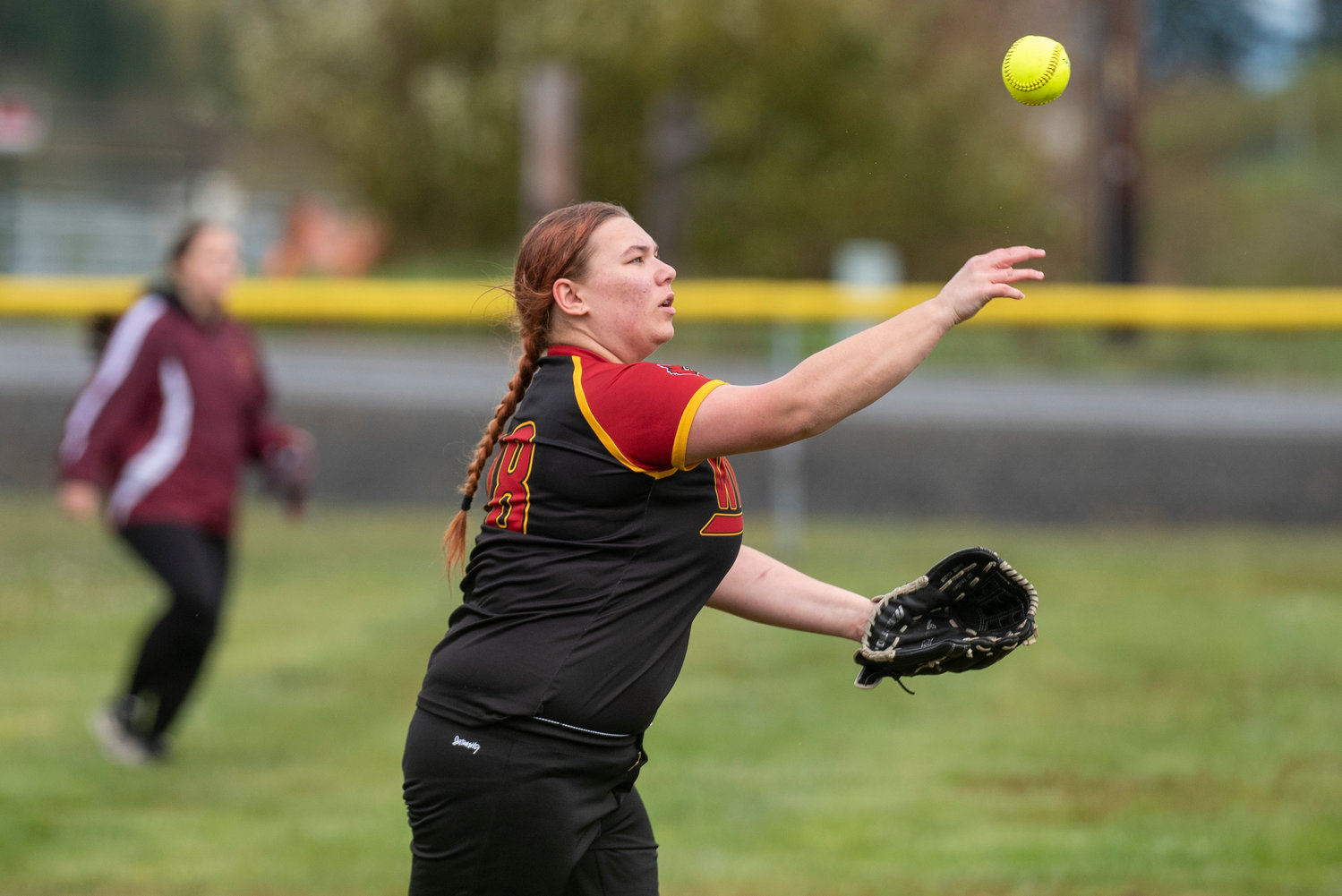 Winlock right fielder Josalynn Shepardson makes a throw to the infield after an Onalaska base hit during a home game on April 21.