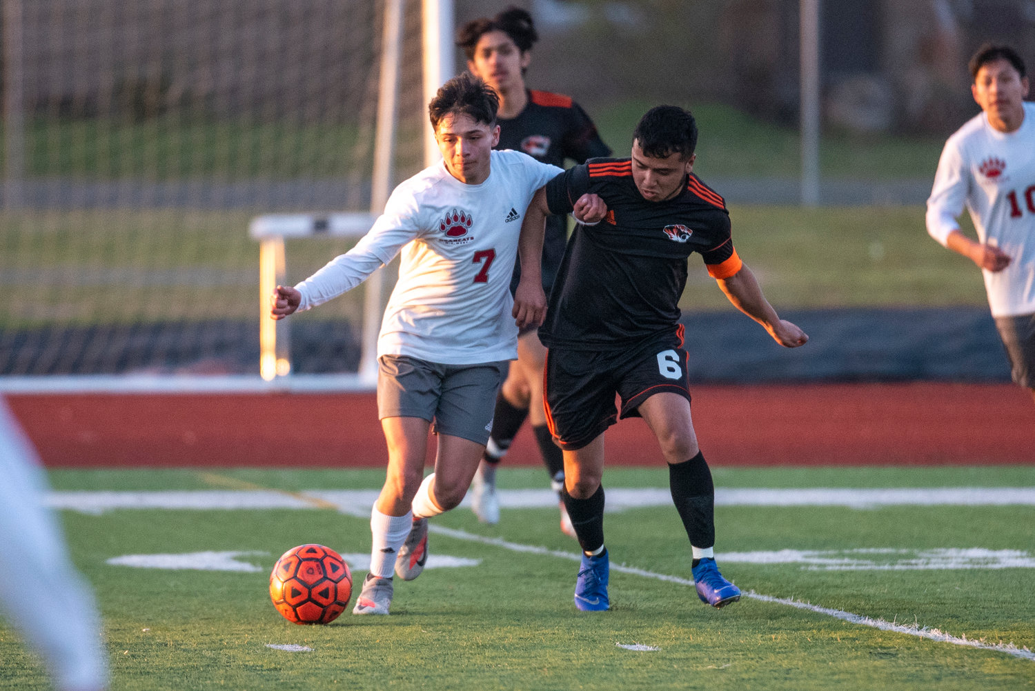 W.F. West's Damian Hernandez (7) and Centralia's Jamie Figuroa (6) battle for possession on April 22.