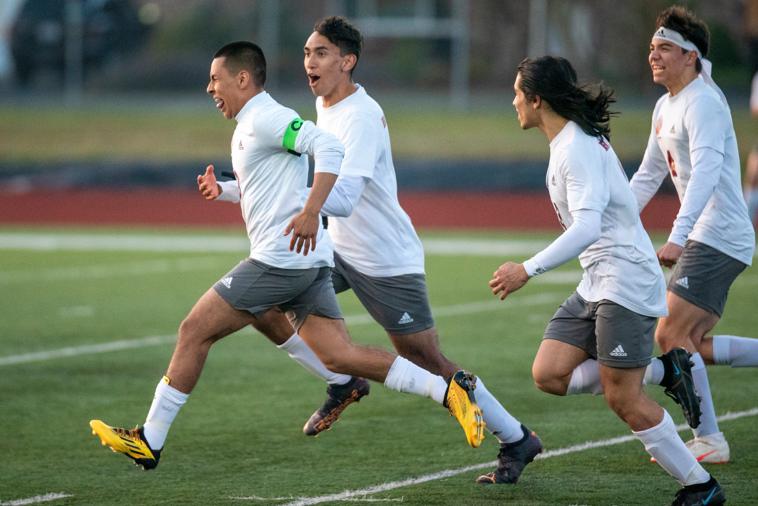 W.F. West's Elvis Leal Perez, left, runs in celebration after scoring a goal in the 27th minute against Centralia on April 22.